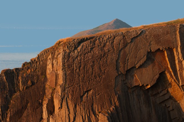 Cliffs north of Cardigan with  Foel-y-Mwnt in background.