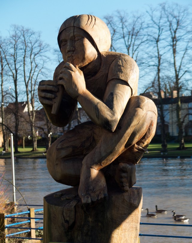 "The Penny Whistle" wood carving by Tom Harvey, at Evesham.