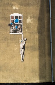 (Slightly defaced) graffiti by Banksy on Park Street.